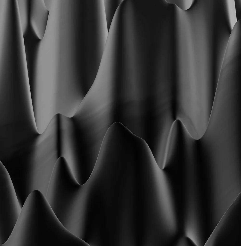 An abstract three dimensional render of a field of soft grey peaks